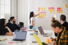 A group of people in a meeting